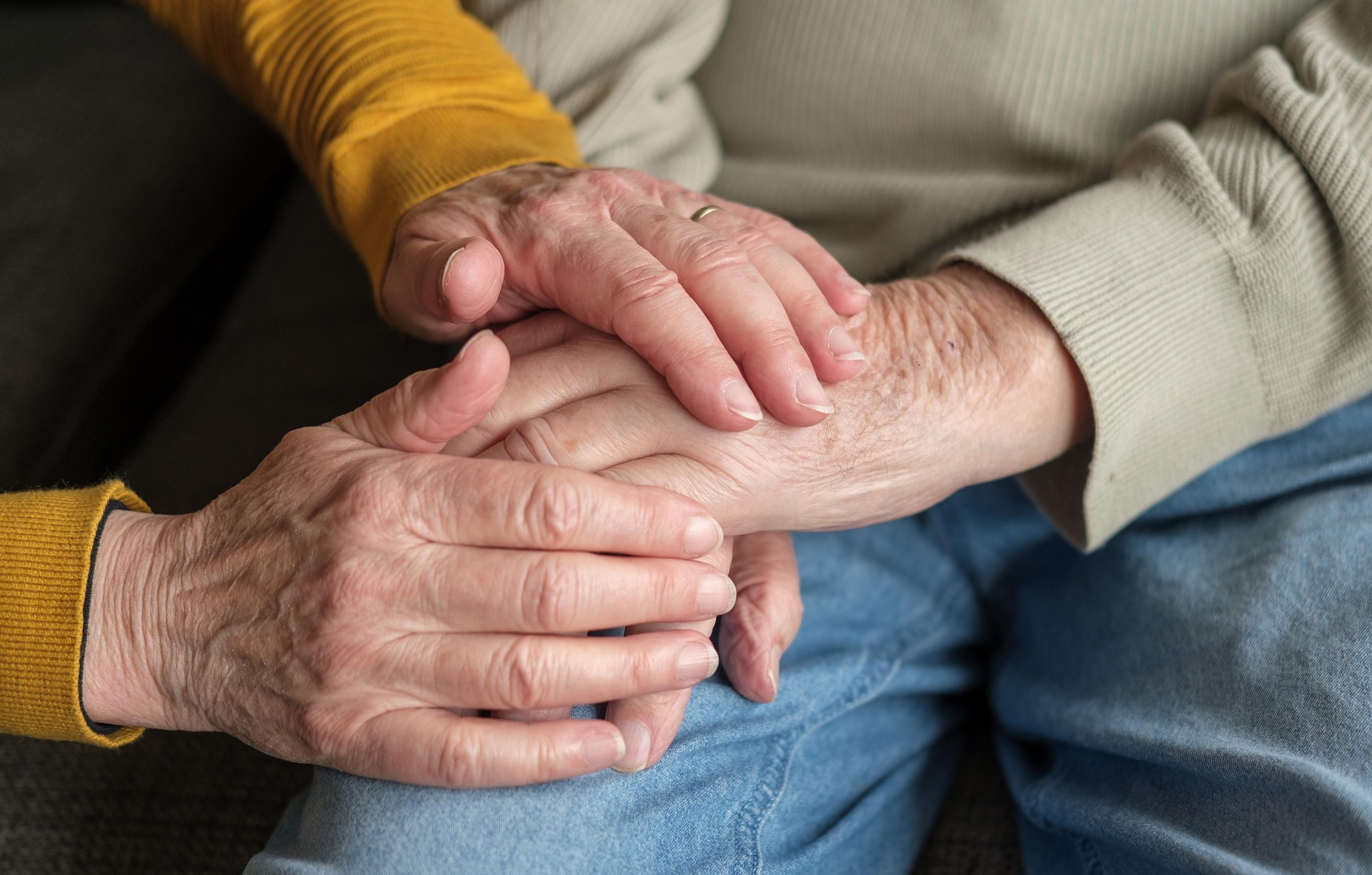 Hands held together in support